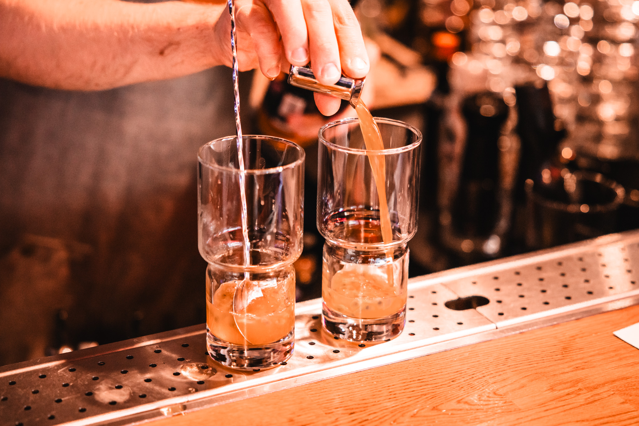 Jigger pour on the bar rail