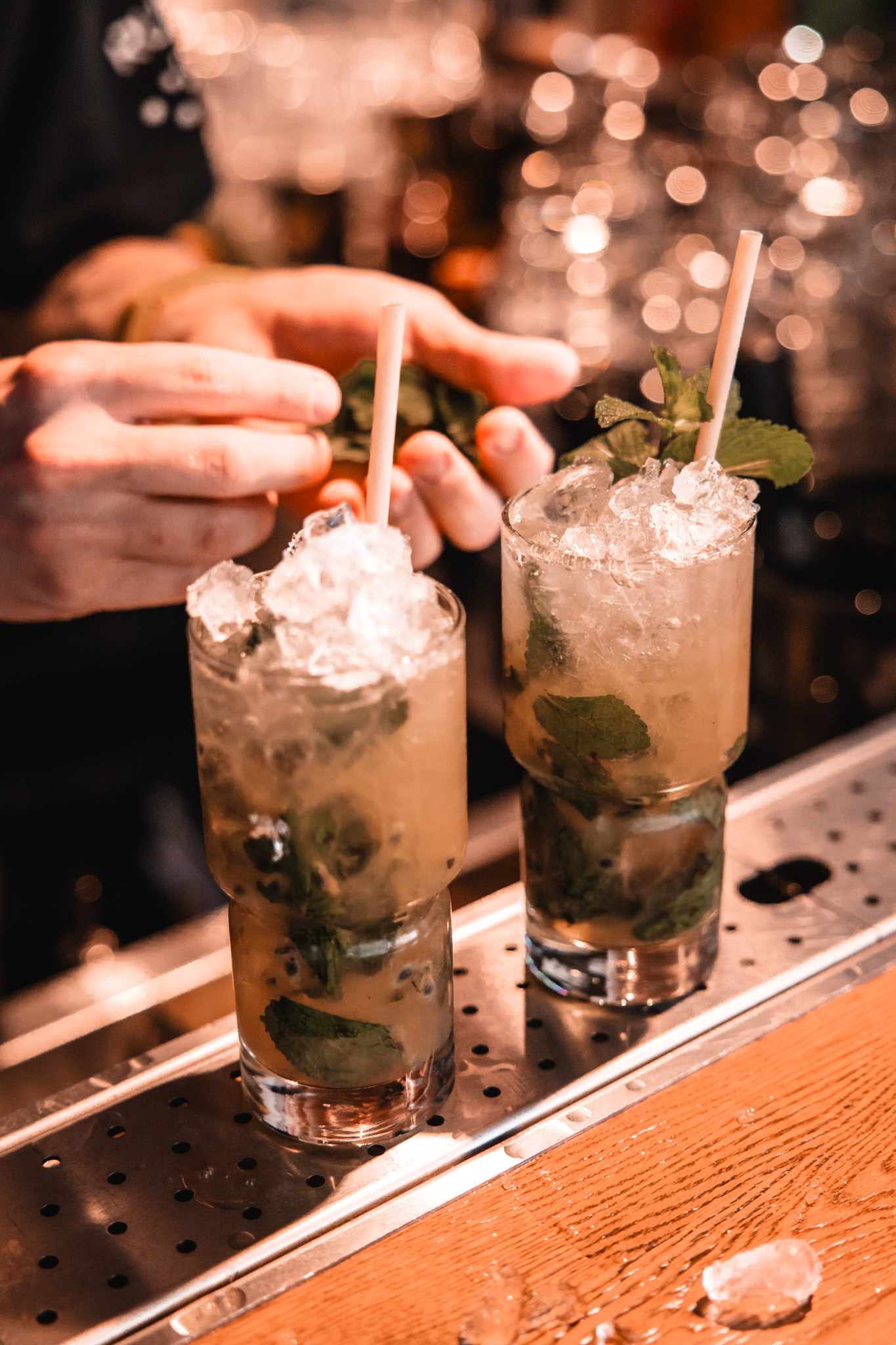 Two mojitos with mint and ice